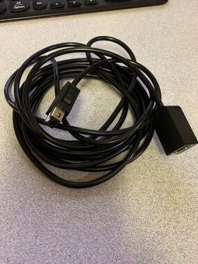 Black Nintendo Wii mote extender Cable
